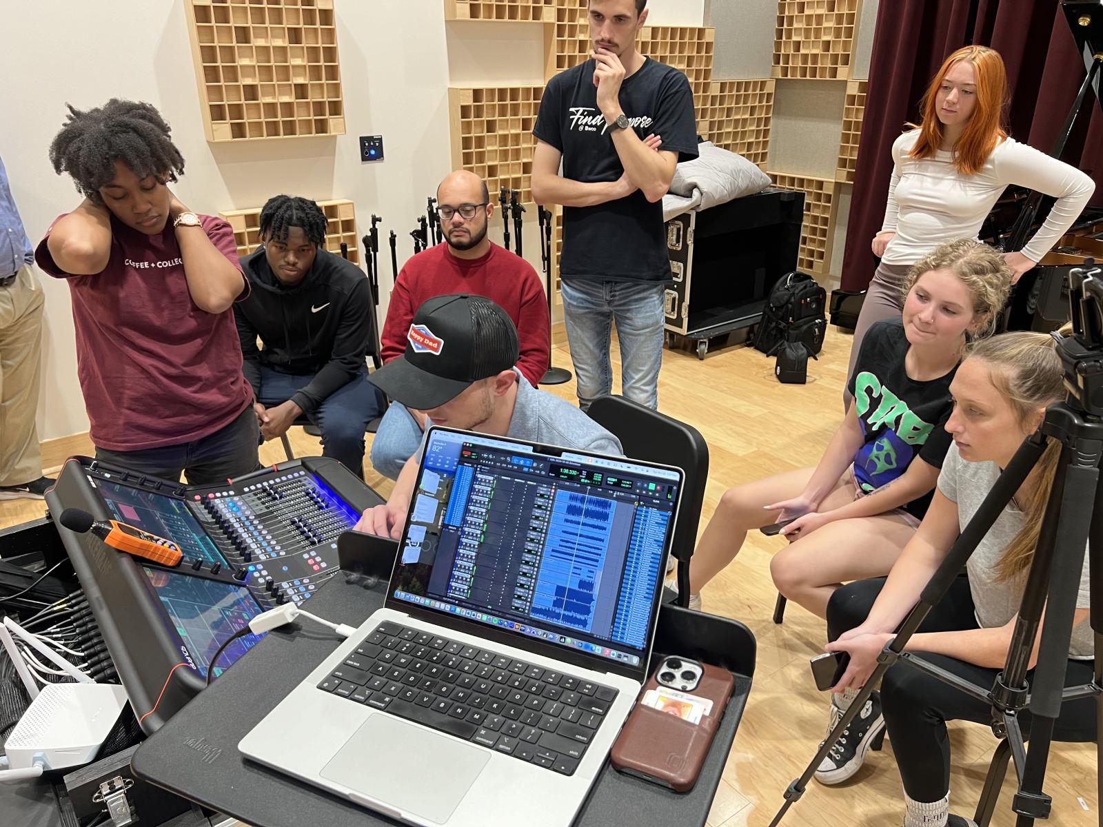 Audio Production students learning about mixing techniques for live audio events.