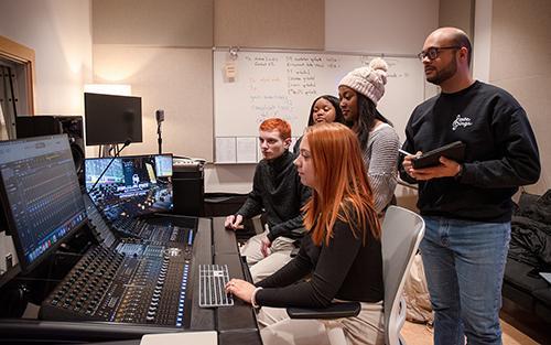 Students working on a soundboard