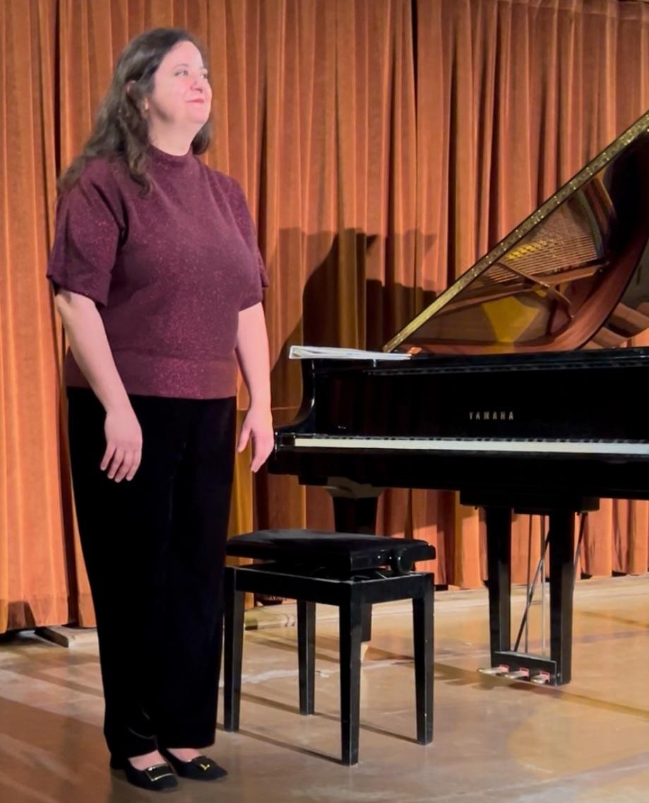 Dr. Sebba playing piano